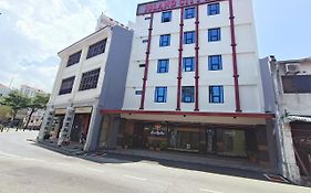Capital O 90897 Island City Hotel